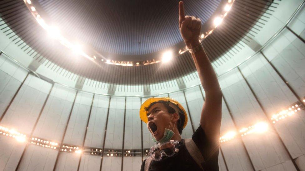 A protester chants slogans during the demonstration.