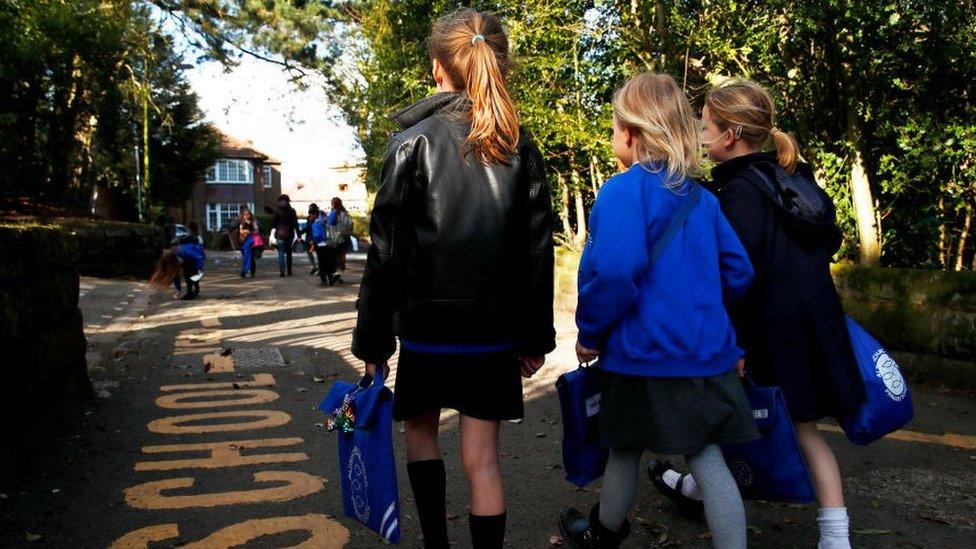 Children arrive at school