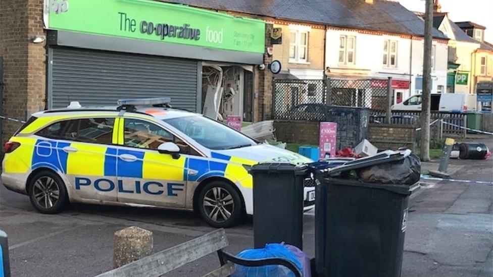 Police car outside Co-op in Cambridge