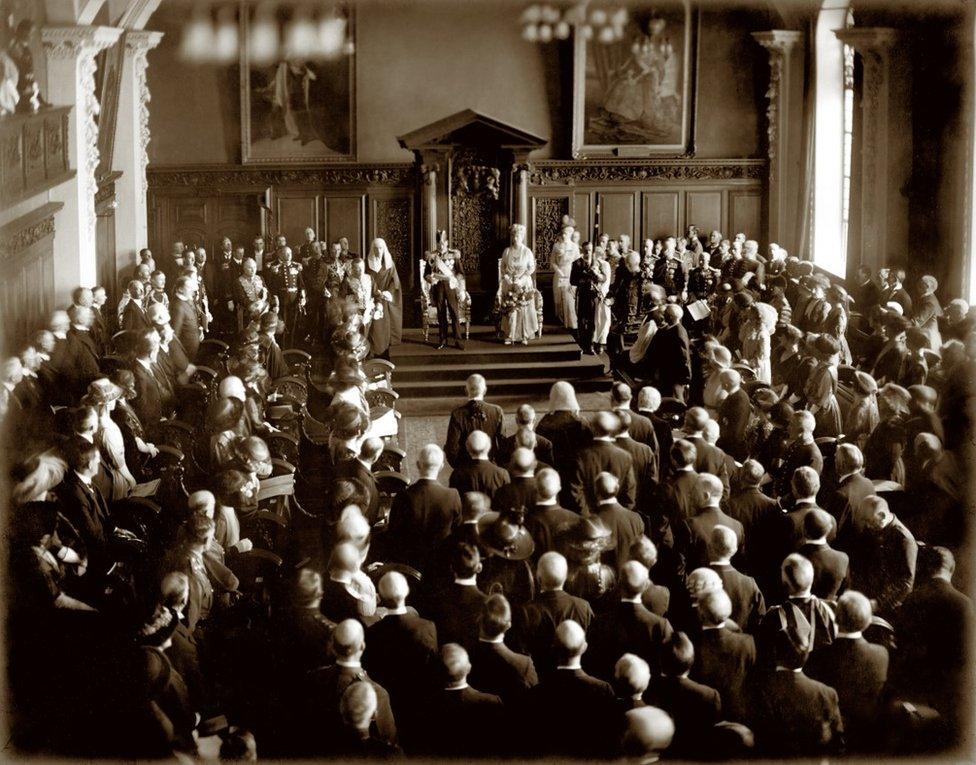 King George V and Queen Mary inside City Hall with members of the new Northern Ireland parliament