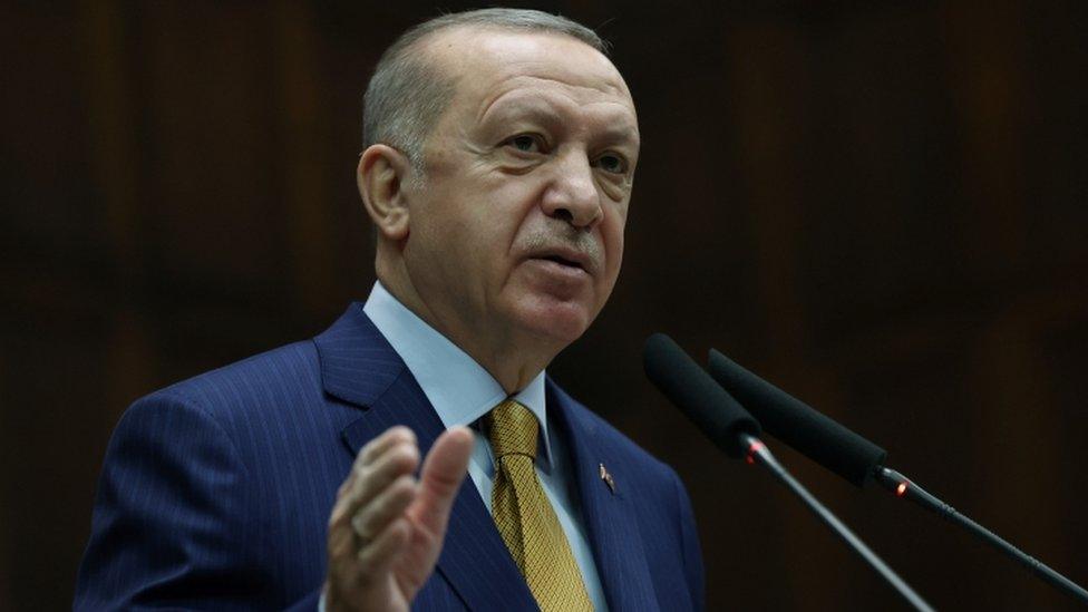 Turkish President Tayyip Erdogan addresses members of his ruling AK Party during a meeting at the parliament in Ankara, Turkey, December 23, 2020