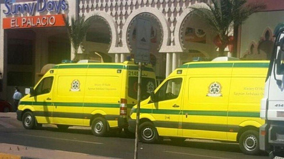 Ambulances wait, according to a local witness, in front one of two beach resorts were the stabbing attacks occurred, in Hurghada (14 July 2017)