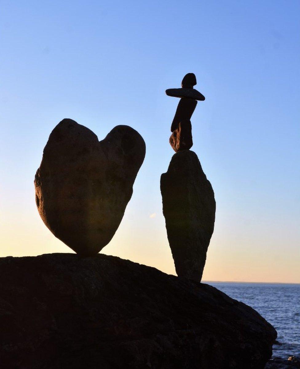 Stone stacking involves balancing rocks and stones in unlikely ways