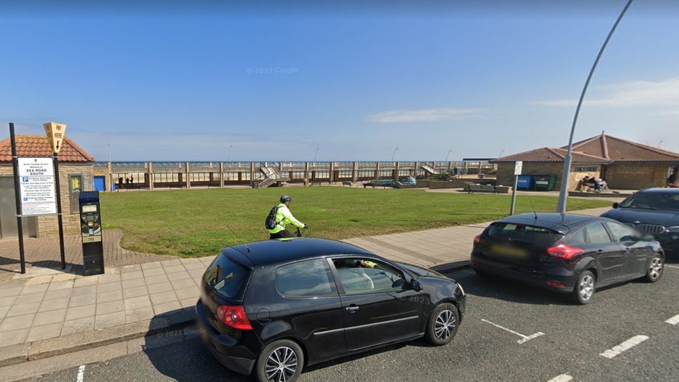 The covered walkway between the beach and Sea Road