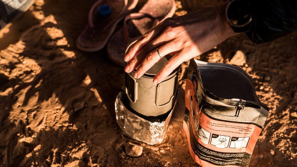 Freeze-dried food and a camping stove in the Sahara desert