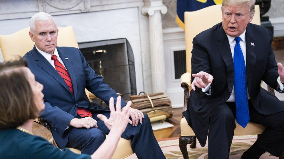 President Donald J. Trump debates with House Minority Leader Nancy Pelosi, D-Calif., left, and Senate Minority Leader Chuck Schumer, D-N.Y., right, as Vice President Mike Pence listens during a meeting in the Oval Office of White House on Tuesday, Dec. 11, 2018 in Washington, DC