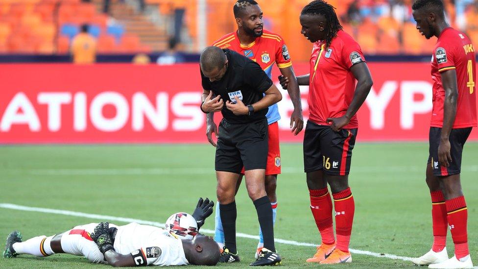 Denis Onyango on the floor with heat exhaustion