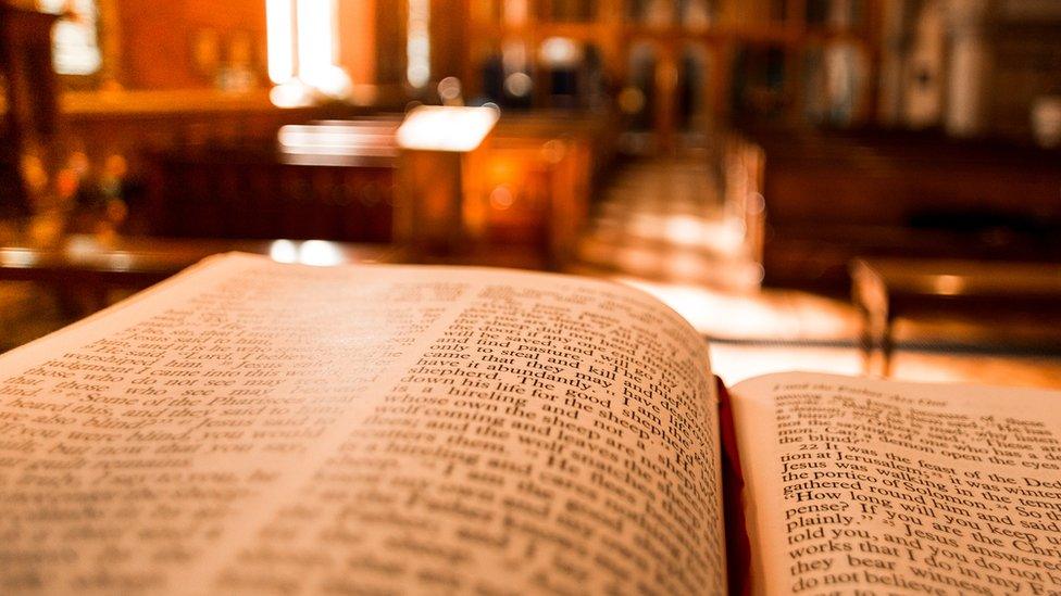 A generic image of a bible in a church