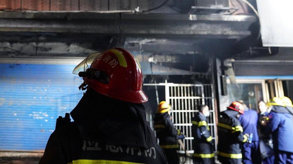 This photo taken on Jan. 24, 2024 shows the exterior view of the building where a fire broke out in Xinyu City, east China's Jiangxi Province.