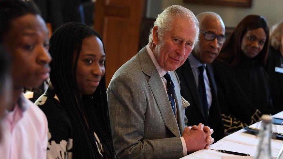 The Prince of Wales (centre) and Principal Lord Woolley attend a session on "Get In Cambridge" during a visit to Homerton College at the University of Cambridge, to discuss access to education and learn of the college"s vision to welcome and support students from diverse backgrounds.