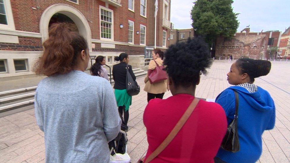 Residents walking to Town Hall