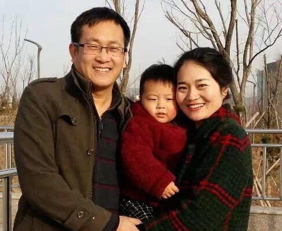 Wang Quanzhang, his wife Li Wenzu and their child