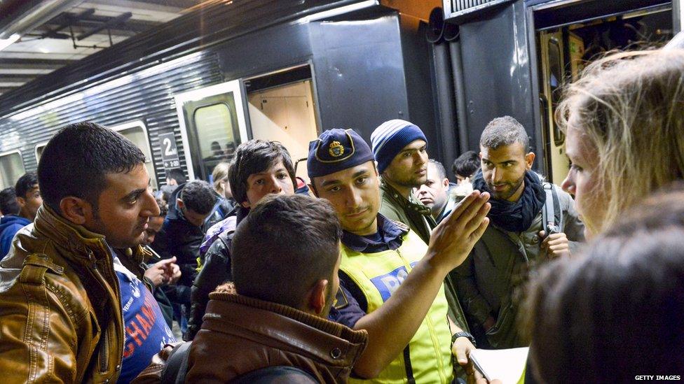 Refugees arrive at Stockholm station