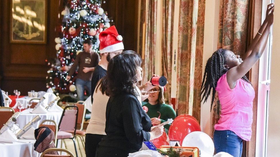 Volunteers setting up for the Manchester Christmas Dinner in 2016