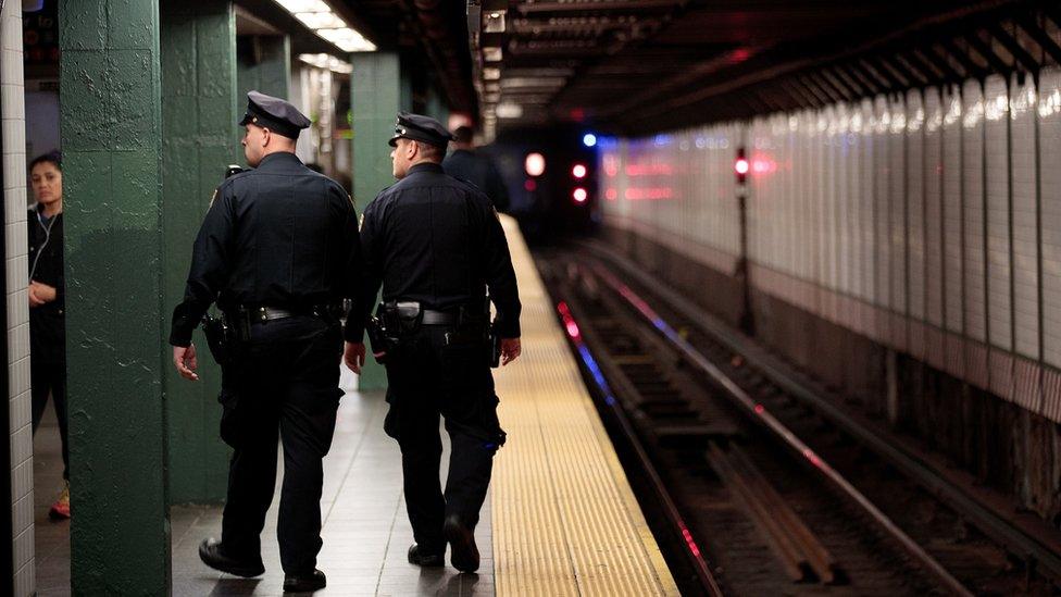 New York City Police patrol a subway station in Times Square - 7 November 2016