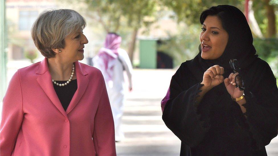 British Prime Minister Theresa May (L) walks alongside the Saudi Princess Reema Bint Bandar al-Saud in 2017