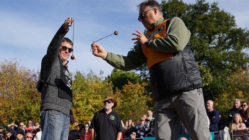 Randy Topolnitsky, from Calgary in Canada, takes the winning shot in the men's competition