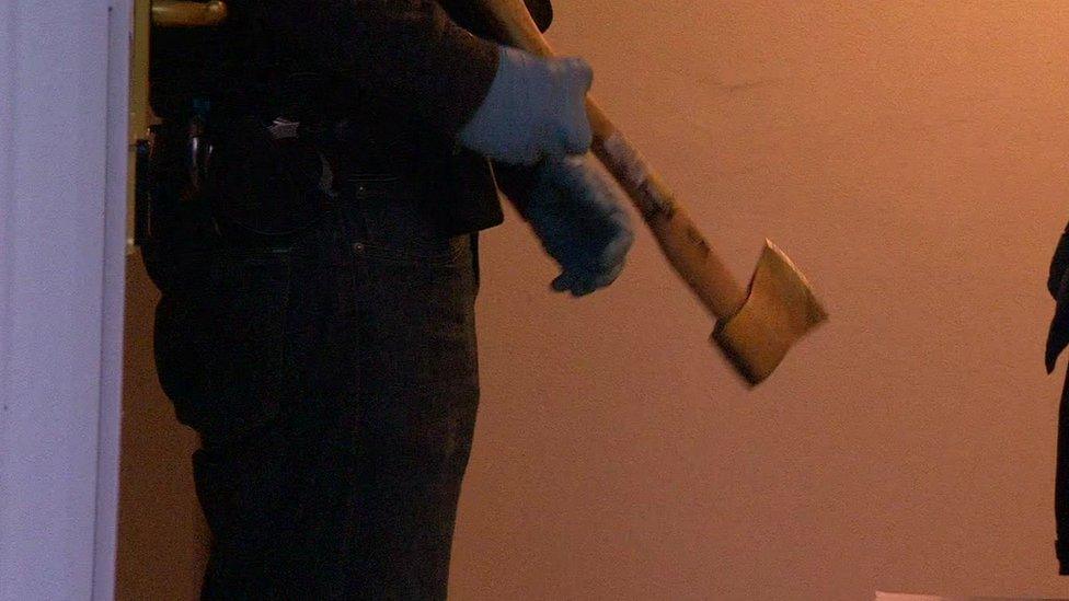 Axe recovered by police in property