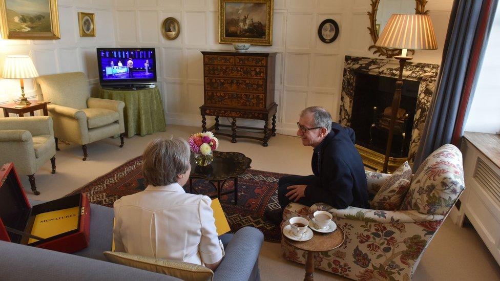 Theresa May and husband Philip watching ITV show The Chase at Chequers