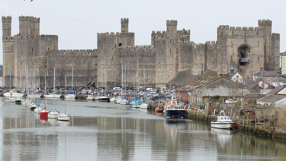 The imposing Caernarfon Castle protecting the Menai Strait was captured during an Easter weekend stroll by Greg Mape