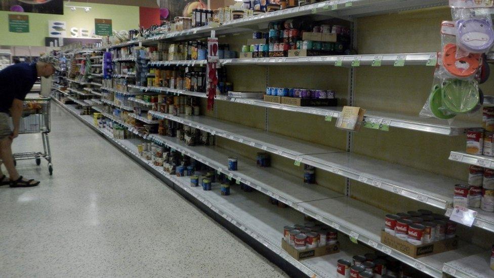 Soup shelves are almost empty in a super market