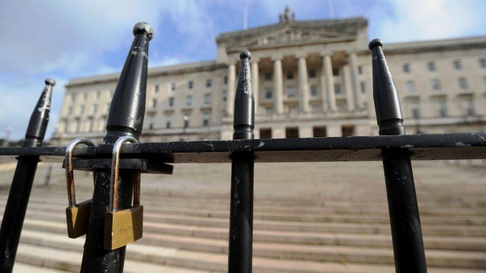 A padlock in front of Stormont