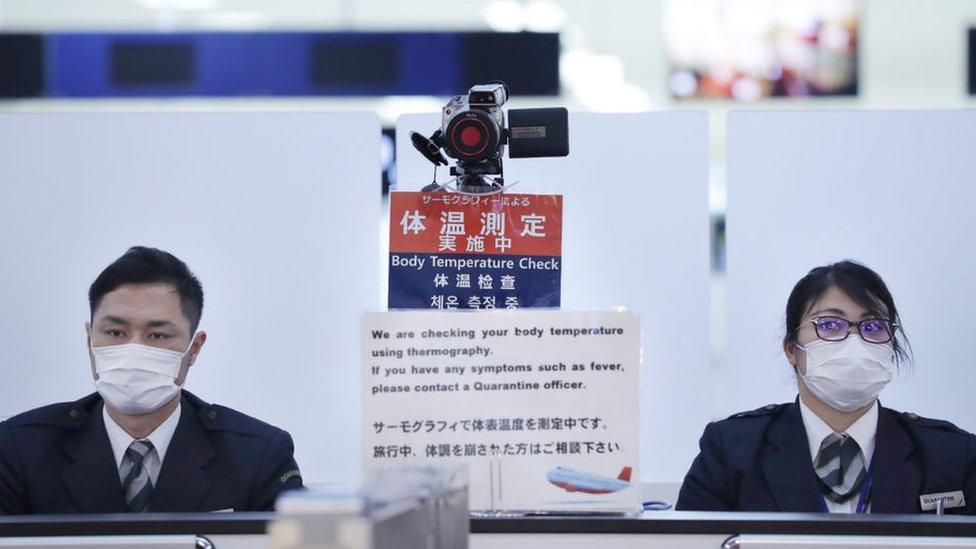 Officers at Narita airport