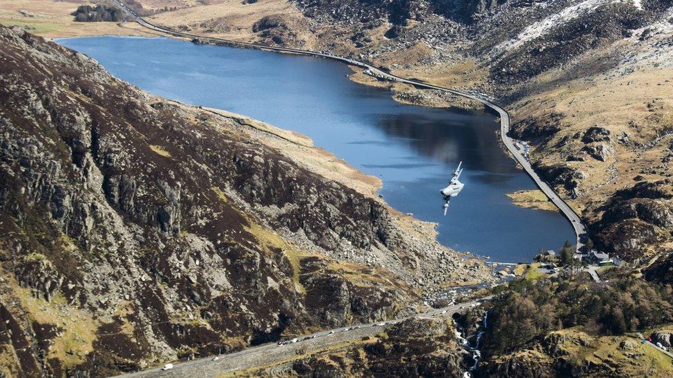 Aircraft banking over Llyn Ogwen, Snowdonia