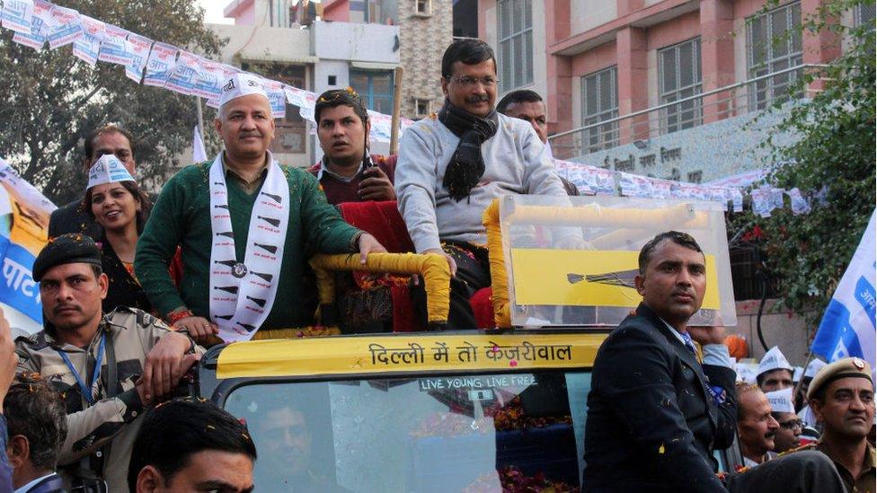 Arvind Kejriwal on a roadshow following his party's win in Delhi state polls