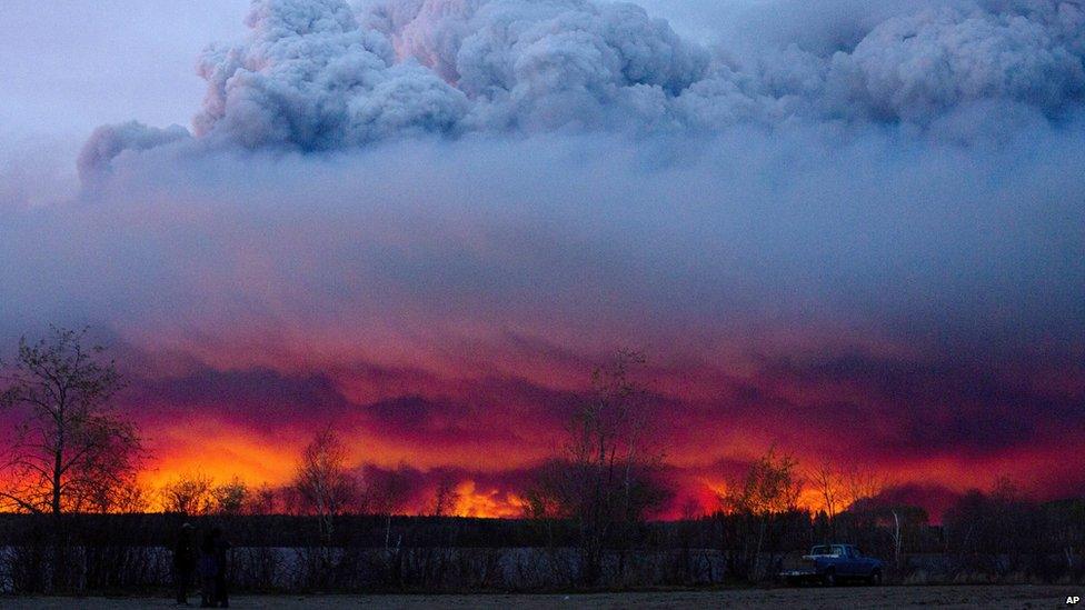 A huge cloud forms over the wildfires in Fort McMurray, Canada.