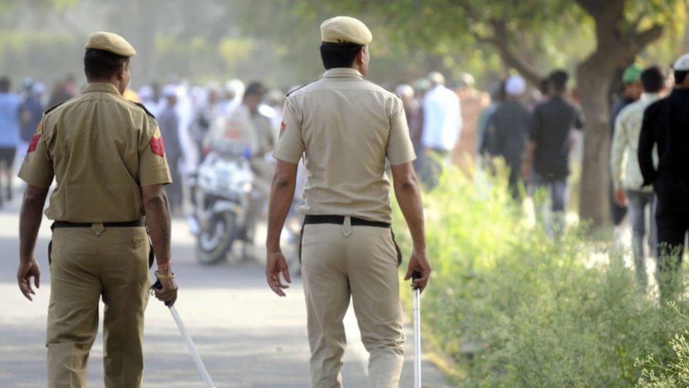 GURUGRAM, INDIA APRIL 22: Police deployment at sector-29 ground during the Muslim community offers Namaz on the occasion of Eid-ul-Fitr near Leisure Valley Park, on April 22, 2023 in Gurugram, India. Muslims around the world are getting into the festive Eid spirit as the holy month of Ramadan concludes. The festival is marked by feasting, praying, and engaging in humanitarian activities. The celebrations marked the end of the holy month of Ramzan. (Photo by Parveen Kumar/Hindustan Times via Getty Images)