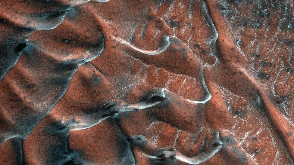 An image showing 'frosty' hills on mars