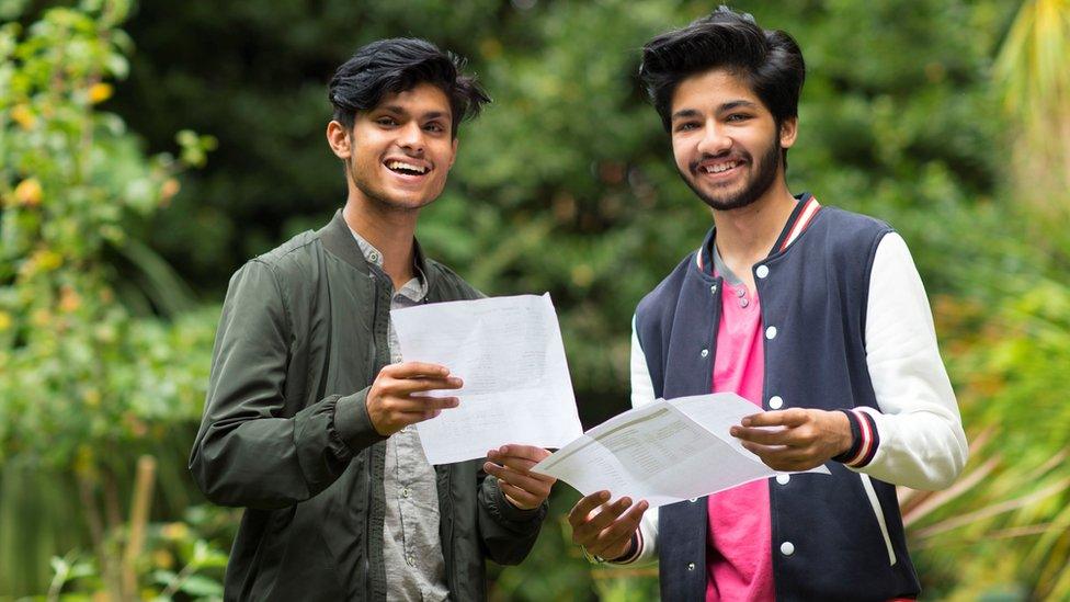 Abu Latif celebrating 11 A* grades and Adan Khan who has five A*s and four As at Ffynone House School in Swansea