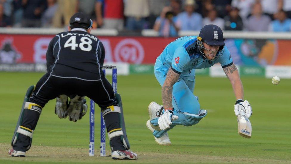 Ben Stokes dives.