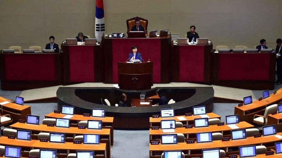 Seo Young-Kyo (centre), a lawmaker of South Korea's main opposition Minju Party, delivers a speech to call for revision of a disputed anti-terrorism bill on the main floor of the parliament in Seoul (29 February 2016)