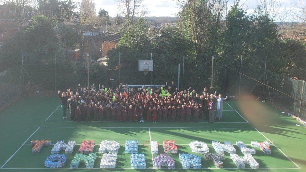 St Edward’s Prep spelling "There is only one Earth" in plastic bottles