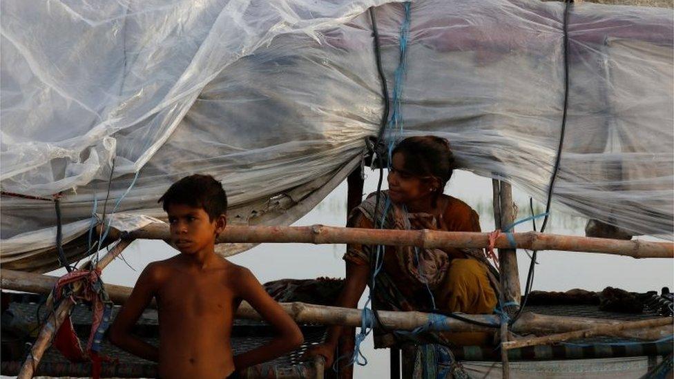 Flood victims at their makeshift family tent in Mehar, Pakistan August 29, 2022.