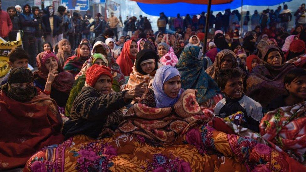 Women protesters along with their children participate in a sit-in against National Register of Citizens (NRC) and recently passed Citizenship Amendment Act (CAA), at Shaheen Bagh