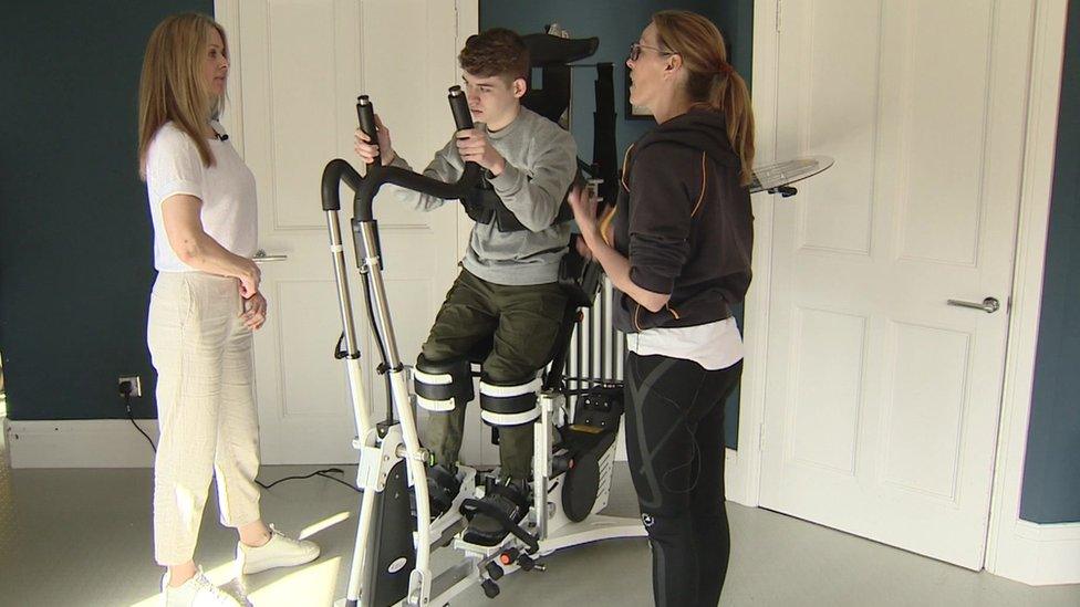 Sam using the Innowalk training machine