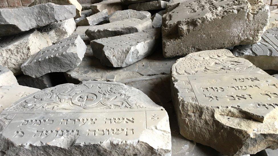 Smashed gravestones from Jewish cemetery