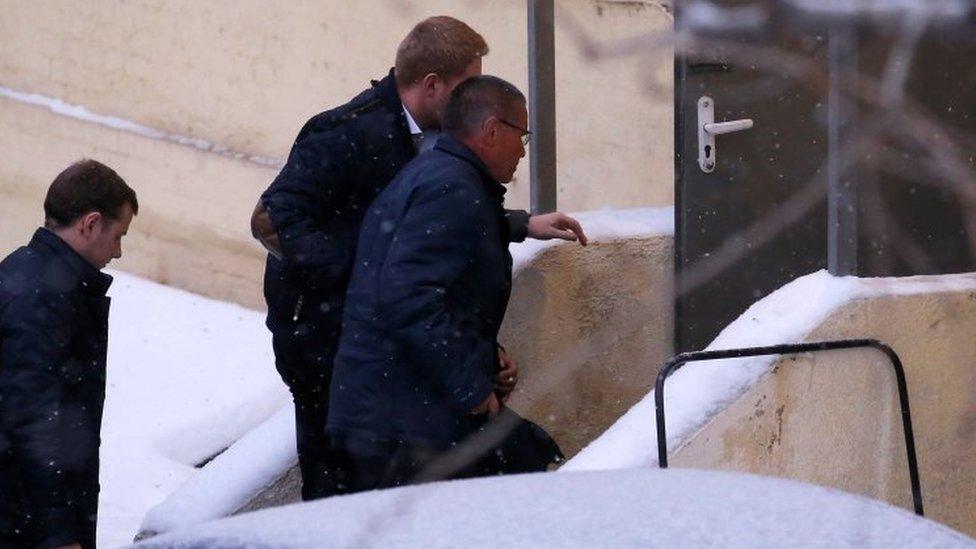 Alexei Ulyukayev (right) is escorted upon his arrival for a hearing at court in Moscow. Photo: 15 November 2016