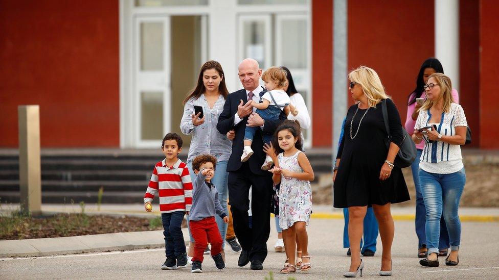 Hugo Carvajal and his family outside Spanish court