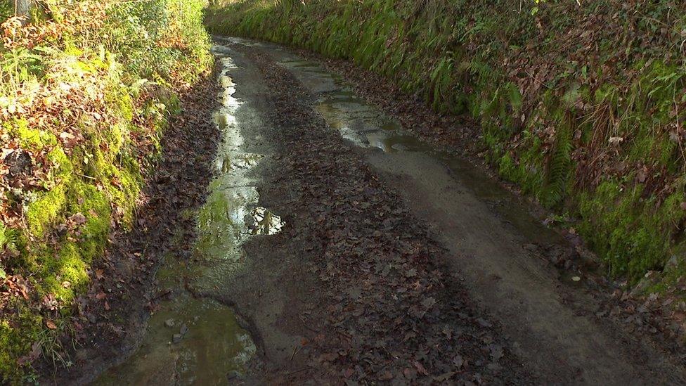 Potholes on Mill Lane