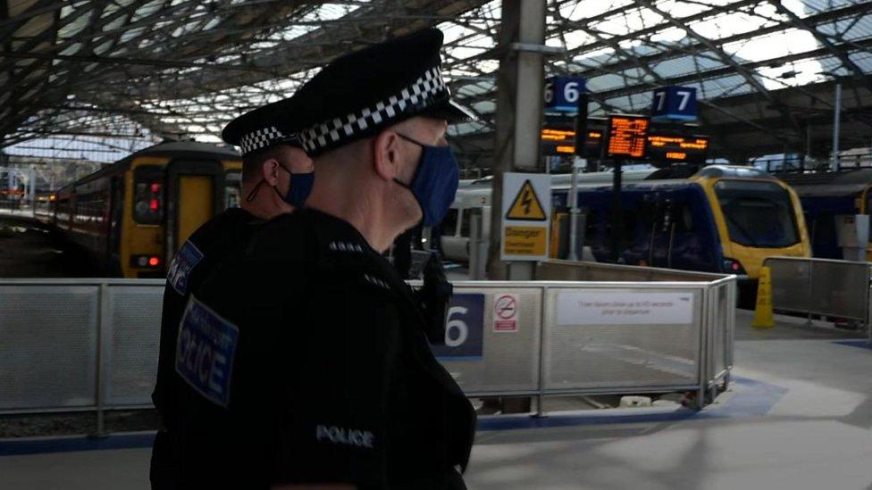 Police in a railway station