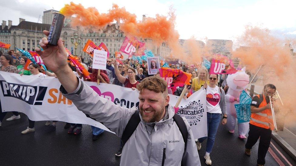 NEU members on strike earlier this year