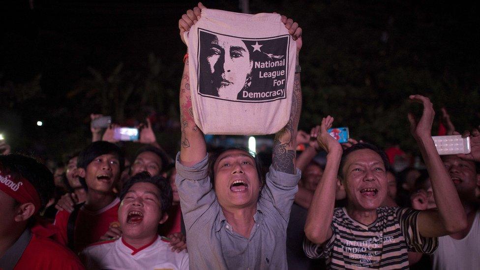 National League of Democracy (NLD) supporters celebrate outside NLD headquarters in Yangon