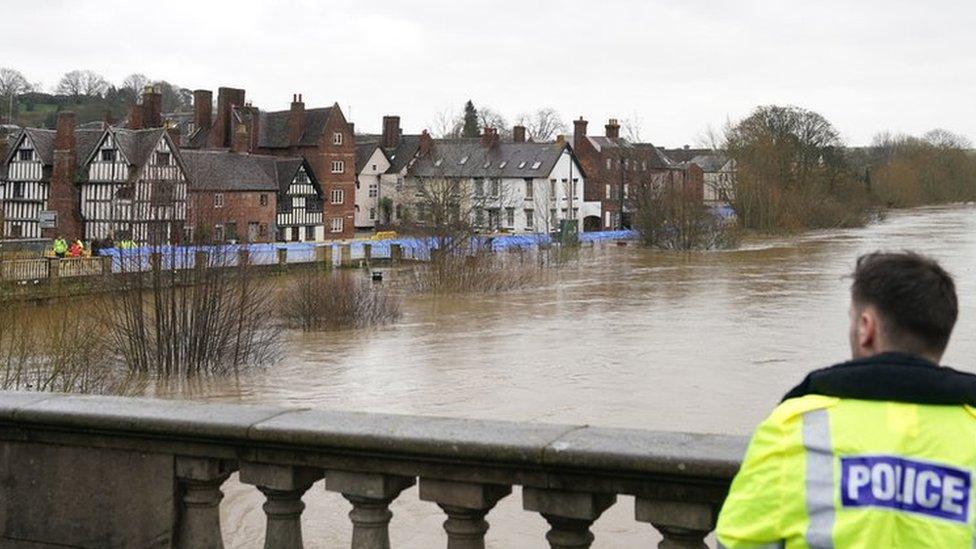 Emergency service on a bridge over the River Severn in Bewdley, Worcestershire