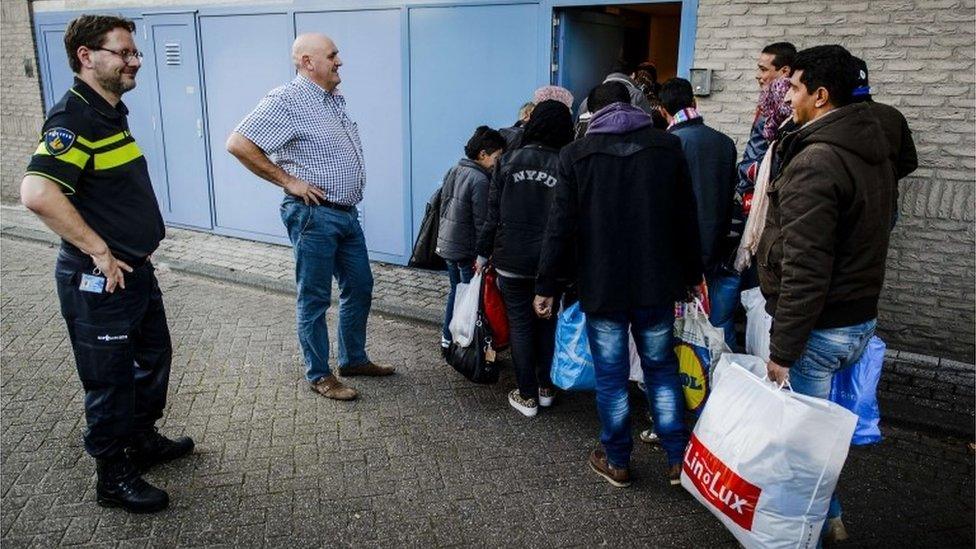 Refugees register in the Dutch city of Rotterdam, 30 September 2015