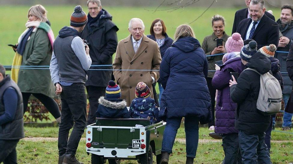 King Charles III talks to people at St Mary Magdalene Church in Sandringham, Norfolk