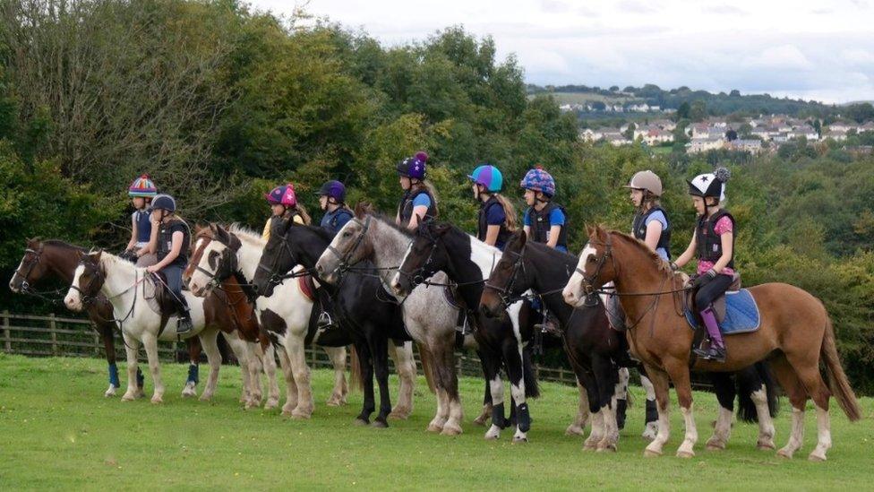 Children on horses before lockdown